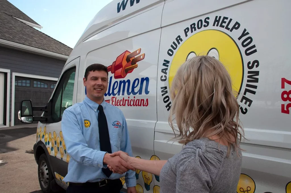 Tech shaking hand with customer
