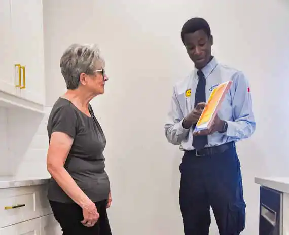 Electricity Bill, How your electricity bill works, Electric Bill, Home owner learning about the electric bill, electrician teaching homeowner about electrical bill